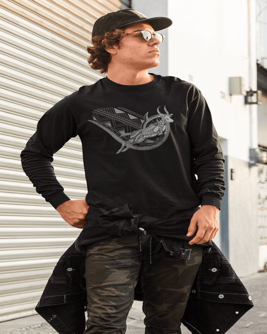 RUGBYNOMAD organic cotton black heavyweight long sleeve tshirt on a male model wearing a black hat looking away with a south africa tribal design